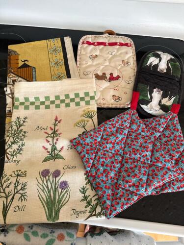 Assorted Vintage Kitchen Linens and Potholders with Farm and Herb Designs