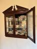 Wall-Mounted Pediment-Top China Display Cabinet with Teacups
