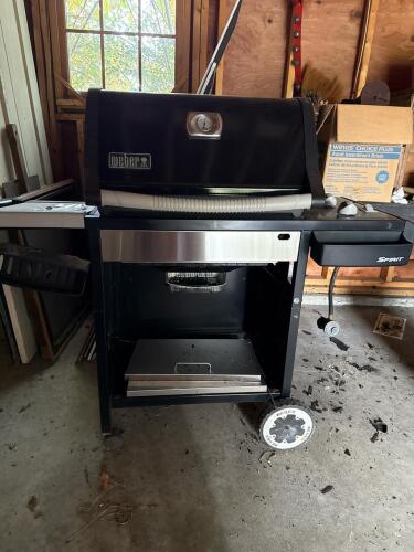 Weber Spirit Gas Grill With Side Shelf And Wheels