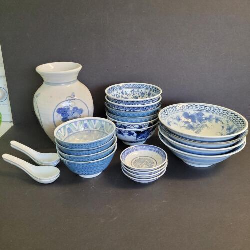 Blue and White Porcelain Bowls, Spoons, and Vase Assortment