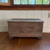Rustic Wooden Storage Chest with Carved Feet