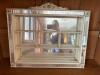 Wall Shelf With Mirrored Back and Decorative Frame