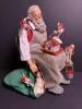Clothique Santa's Helpers Figurine Santa with Elves and Doll