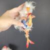 Whimsical Christmas Figurines With Feather Trim And Festive Attire - 4