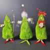 Whimsical Christmas Tree Figurines in Festive Attire