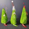 Whimsical Christmas Tree Figurines in Festive Attire - 2