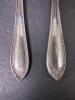 Serving Spoon with Black Handle and Pair of Silverplate Butter Knives - 6