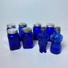 Eight Cobalt Blue Glass Salt and Pepper Shakers Including Figural Pair