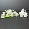 Miniature Porcelain Peek-A-Boo Tea Sets