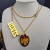 Elvis Presley Gold-Tone Photo Necklace and Bracelet Jewelry Set - 2