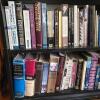Bookshelf with Assorted Hardcover and Paperback Books