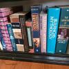 Bookshelf with Assorted Hardcover and Paperback Books - 2