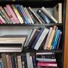 Bookshelf with Assorted Hardcover and Paperback Books - 3