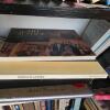 Bookshelf with Assorted Hardcover and Paperback Books - 4