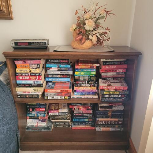 Bookshelf With Thriller and Mystery Books in Paperback and Hardcover