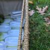 Wicker Picnic Basket with Utensils and Green Glass Stemware - 6